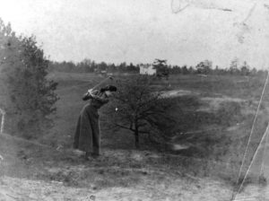 Looking north-east from Morningside Avenue near Durie Street, Muriel Dick is seen here enjoying golf. The white houses in the background are on the west side of Beresford Avenue between Bloor and DeForest. Nine hole golf course was built by the Epiphany Anglican Church. Swansea was the first small community in York County to have a golf links. The club house "Herne Hill Cottage" was on the East side of Ellis Avenue. Photo via Toronto Library.