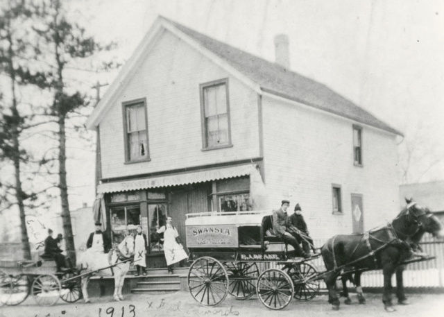 Howard's grocery store, 33 Lavinia Ave, 1913. A very popular stop for children coming and going to school. Earl Rabjohn (driving white horse) ; unidentified figure seated beside him; Walter Edge; Fred Edwards; Mr Hall; unidentified man on cart; Roy Rabjohn (on cart). Photo via Toronto Public Library