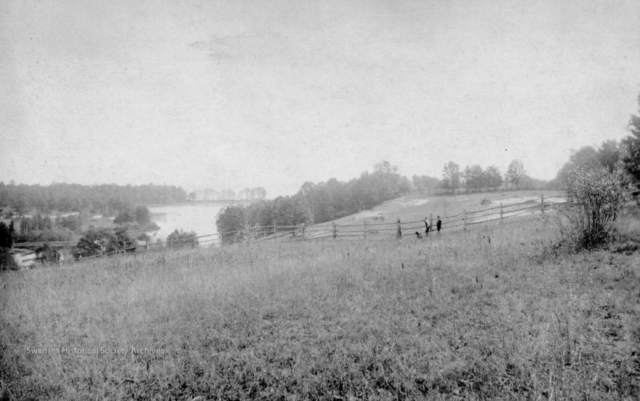 Swansea, 1900. This view looks south from Morningside, east of Ellis Avenue, with Grenadier Pond on the left. The sand bar between the Pond and Lake Ontario can be seen at the south end of the Pond.